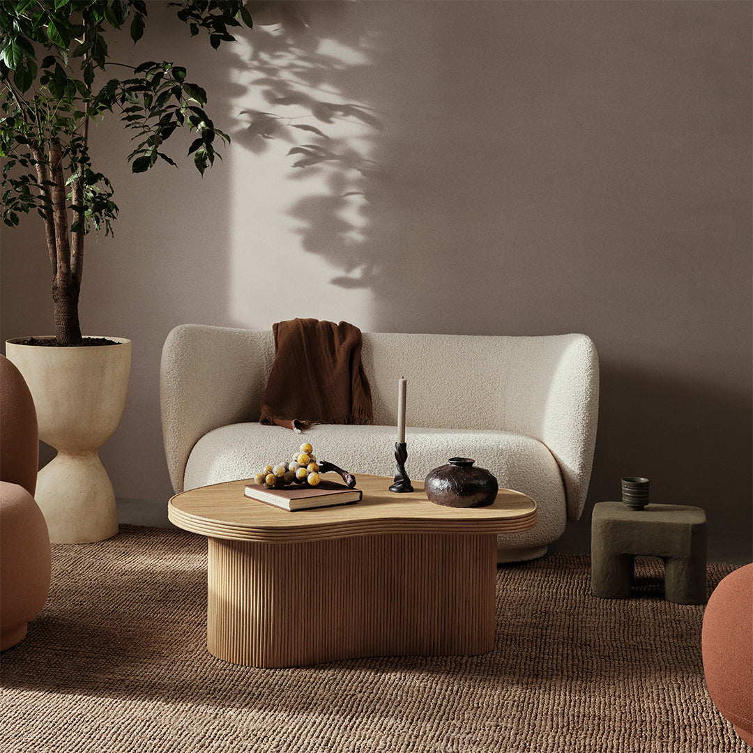 Cream Rico sofa with oak coffee table in soft afternoon light
